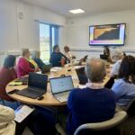 Participants of the PEACEPLUS ‘Investing in Community Volunteers’ Programme attending the Introduction to Social Media, AI Tools & Canva training, focusing on building confidence in social media, using AI tools for content creation, and designing simple promotional materials in Canva