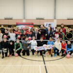 Chairman of Fermanagh and Omagh District Council, Councillor Barry McElduff, pictured with Chairman of the PEACEPLUS Partnership, Councillor Errol Thompson, Deborah McCartan, PEACEPLUS Co-ordinator, Pauline Quinn of delivery partner Todd’s Leap, Stephen Beattie of AB Coaching, and young people from across the Fermanagh and Omagh District taking part in the first activities of the PEACEPLUS Community Youth Programme. The programme engaged participants aged 11–16 in team-building challenges, sports activities and workshops focused on respect, diversity and mental health, helping to build confidence, develop new skills and foster positive relationships across communities.