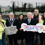 Chairman of Fermanagh and Omagh District Council, Barry McElduff and Chairman of the PEACEPLUS Partnership, Councillor Errol Thompson with Clare Shannon, Project Officer for Play Park Strategy, Deborah McCartan, PEACEPLUS Programme Coordinator, Ben Miller, H&S Advisor and Michelle McGinley, Project Officer for Play Park Strategy at Derrygonnelly Community Centre where work is due to commence for a new community play park jointly funded by the Fermanagh and Omagh PEACEPLUS Local Action Plan and Fermanagh and Omagh Distrcit Council.