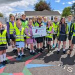 Pupils from McClintock Primary School pictured taking part in a litter pick as part of the PEACEPLUS Environment for All Programme. The activity encouraged environmental responsibility and community pride while helping to improve the local area.