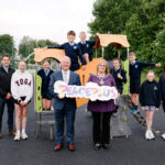 Chair of Fermanagh and Omagh District Council, Councillor Debbie Coyle, and Chair of the PEACEPLUS Partnership, Councillor Errol Thompson, are joined by Stewart Burns, Cleansing Manager, Michelle McGinley, Play Parks Officer and children at the official opening of the new play park in Ederney. The project forms part of the Outdoor Recreational Capital Programme within the Fermanagh and Omagh PEACEPLUS Local Action Plan and is funded through PEACEPLUS, with match funding provided by Fermanagh and Omagh District Council.
